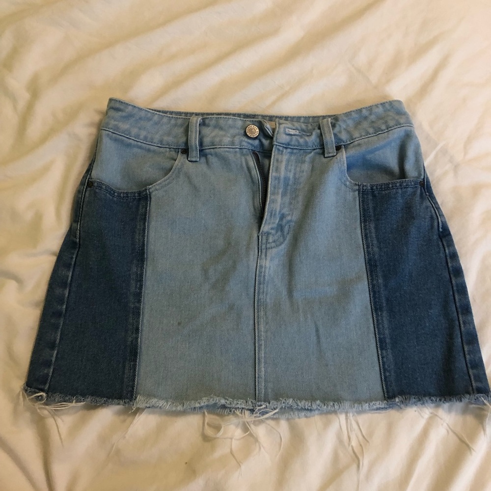 Pacsun denim jean skirt, lightly worn with a minor stain on the front